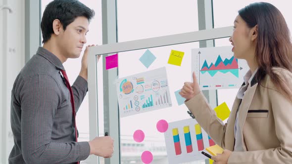 Business People Work on Project Planning Board alt