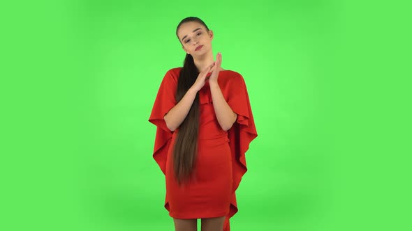 Pretty Young Woman Is Clapping Her Hands with Dissatisfaction. Green Screen alt