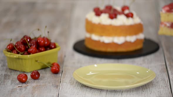 Piece of Cherry Cake With Vanilla Cream. alt