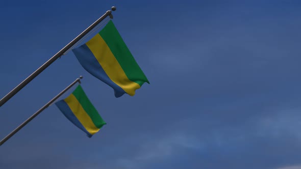 Gabon  Flags In The Blue Sky - 4K
