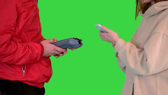 Contactless Paypass Using Smartphone and Electronic Payment Terminal on a Green Screen Chroma Key alt