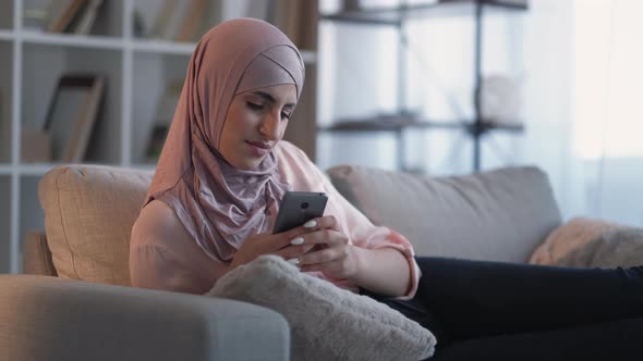 Phone Texting Internet Surfing Woman Sofa Home alt