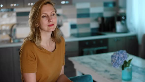 Thoughtful Pretty Dreamy Woman with Looking Aside with Smiling Positive Expression alt