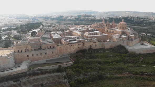 View of Mdina city outside city walls, revealing the Cathedral of Saint Paul  alt