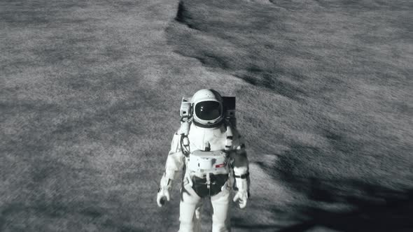 An Astronaut Stands on the Surface of the Moon Among Craters Against the Backdrop of the Planet alt