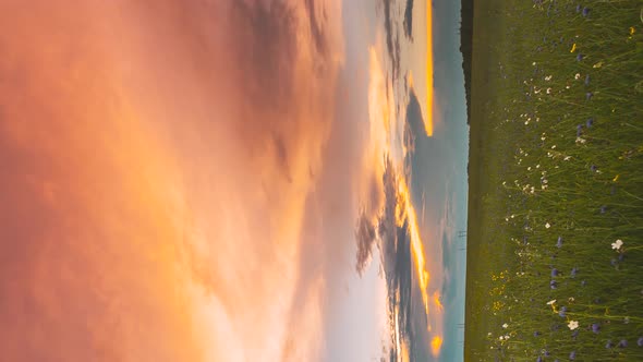 Vertical Hyperlapse Pan Slider Shot  Sunset Cloudy Sky With Fluffy Clouds alt