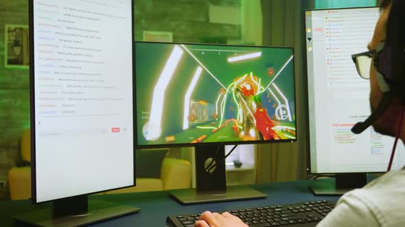 Zoom in Shot of Angry Pro Gamer While Playing Shooter Games alt