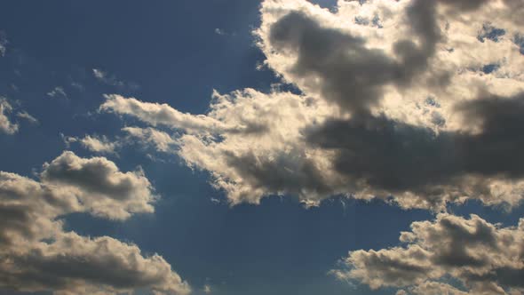 Good Weather White Fluffy Clouds in the Blue Sky View of Timelapse alt