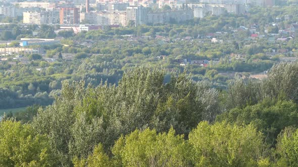 Panorama of the City From Above and the Green Massif
