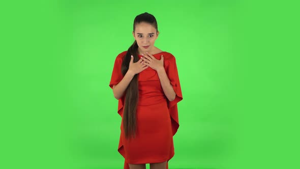 Pretty Young Woman Is Pointing Herself, Say Who Me No Thanks i Do Not Need. Green Screen alt
