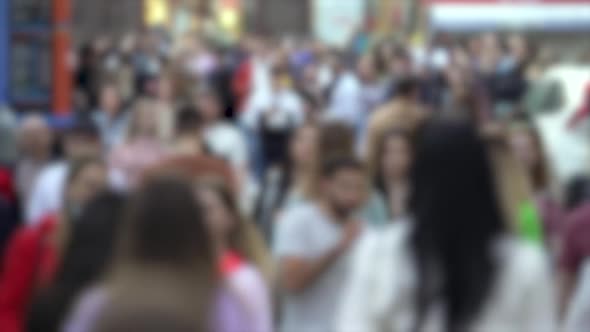 Silhouettes of People Walking in a Crowd Slow Motion alt