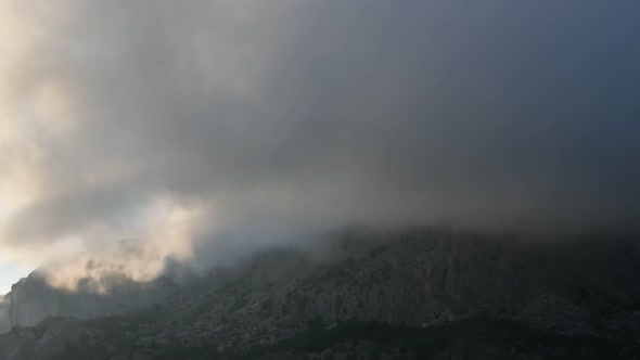 Clouds Float on Top of a Mountain in Crimea