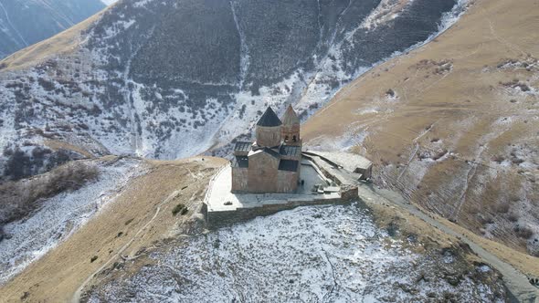 Famous Gergeti Trinity Tsminda Sameba Church In Early Winter Landscape