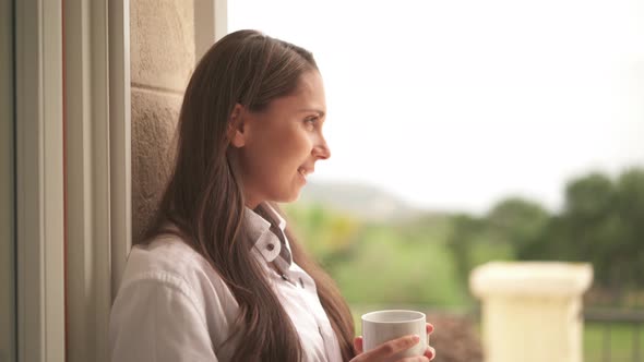 Young Woman Enjoying Coffee