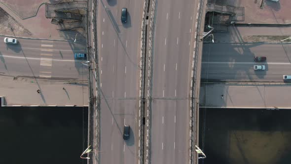  Aerial Top Down View of Traffic of Cars on the Bridge in a Populated City alt