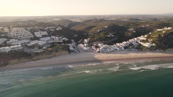 Landscape aerial of Salema, a coastal village in Algarve. Beach holidays destination alt