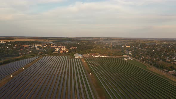 Aerial view of the Solar panels in sunset alt