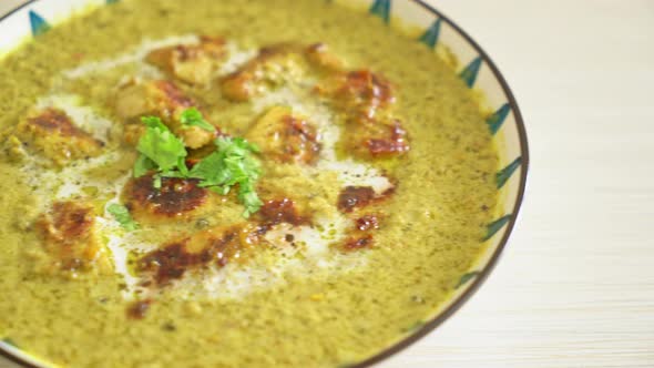 Afghani chicken in green curry or Hariyali tikka chicken hara masala - Indian food style alt