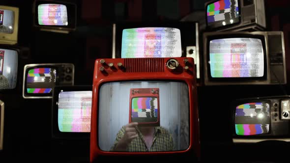 A Test Pattern TV Headed Man on Stacked Retro TVs.