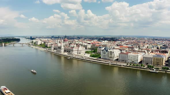 Wide Drone Footage of Danube River and Budapest City Skyline alt