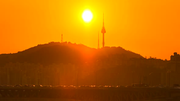 Time Lapse of Seoul City Skyline with Seoul Tower at sunset in Seoul  South Korea 