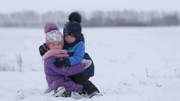 Lovely children at winter holidays. alt