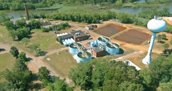 Aerial view of cleaning construction for a sewage treatment in systems surrounding industrial alt