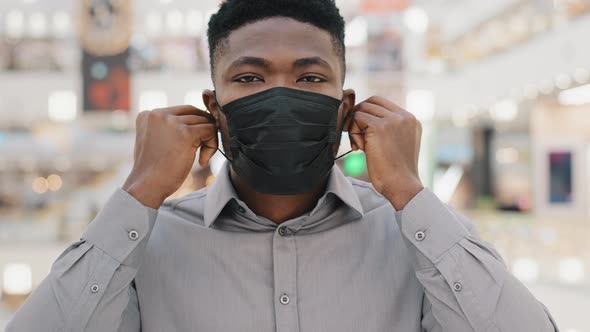 Closeup Young African American Man Wearing Protective Mask Looking at Camera Happy Confident Guy alt