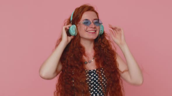 Young Redhead Woman in Dress Listening Music on Headphones Dancing Disco Fooling Around Having Fun alt