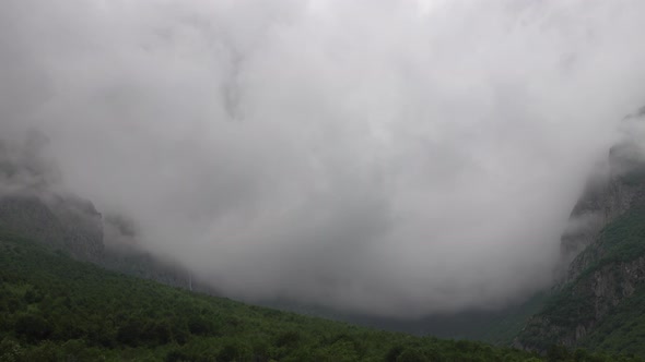 Fast Moving Dramatic Clouds in Mountains alt