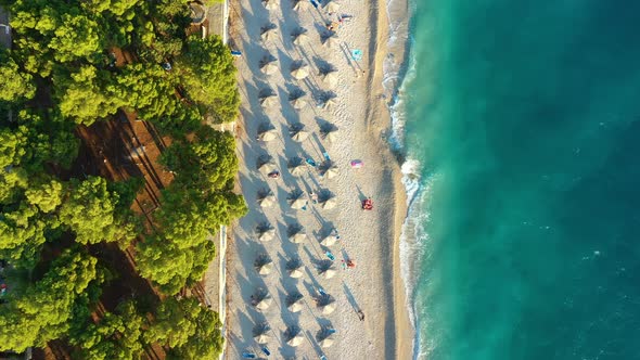 Beach and blue water. Top view from drone at the beach and blue sea. alt