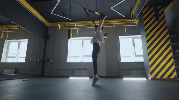 Crossfit Fitness TRX Training Exercises at Gym Woman Pushup Workout alt