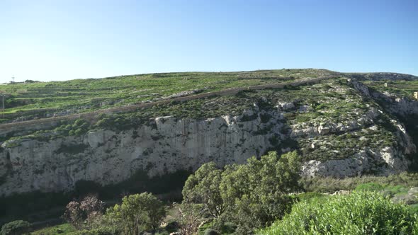 Panoramic View of Magrr Ix-Xini Bay Canyon Cliffs in Gozo Island