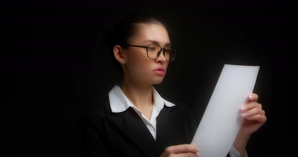 Business Woman is Outraged By Document She Has Read Crumples Sheets of Paper alt