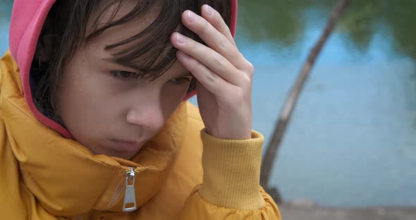 Upset Girl Face By River alt