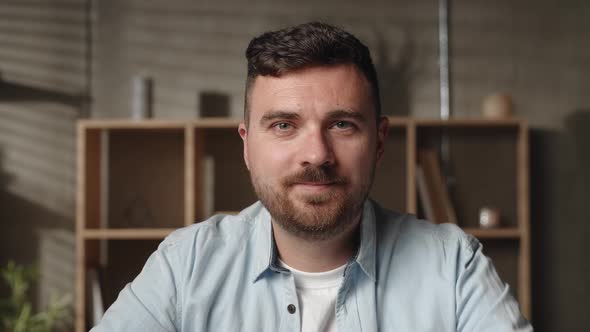 Smiling Bearded Millennial Professional Businessman Looking at Camera alt