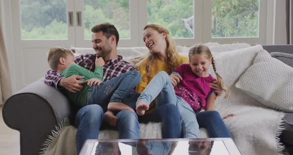 Family having fun in a comfortable home 4k alt