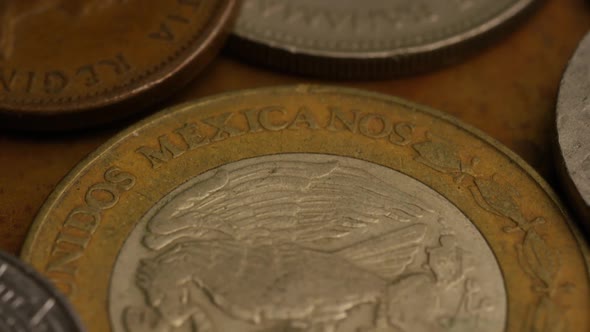 Rotating stock footage shot of international monetary coins - MONEY 0360 alt