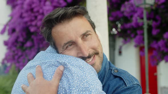 Medium Shot of Bold Gay Hugging His Lover After Long Separation alt