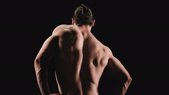 Back View of Athlete Doing Warmup alt