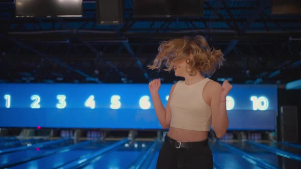 Portrait Young Woman Jump Happily Looking Into the Camera Celebrate the Victory in Slow Motion alt