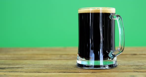 Guinness pint on table for st patrick alt