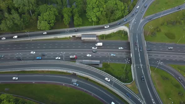 Aerial View Flying Over of Loaded Cars with Traffic Jam at Rush Hour on Highway with Bridge