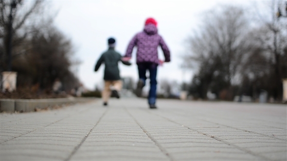 Children Running in an Alley in the Park 01