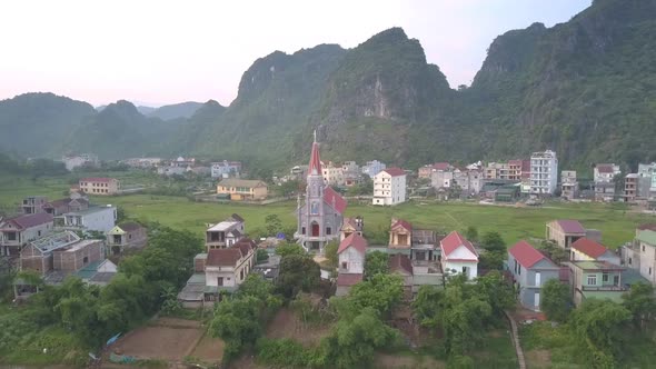 Beautiful Rows of Small Town Pretty Houses and Church alt