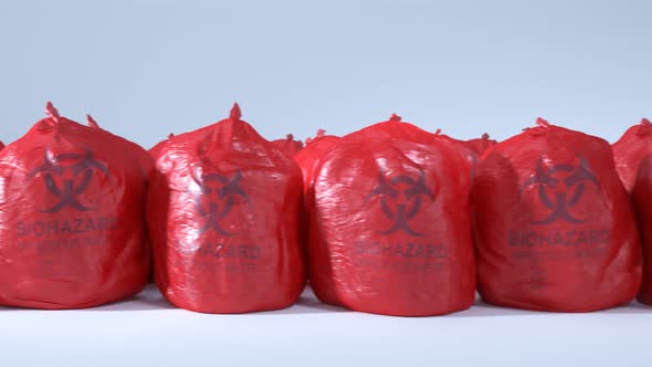Loopable animation of the red bags with the medical waste inside. Seamless 4K alt
