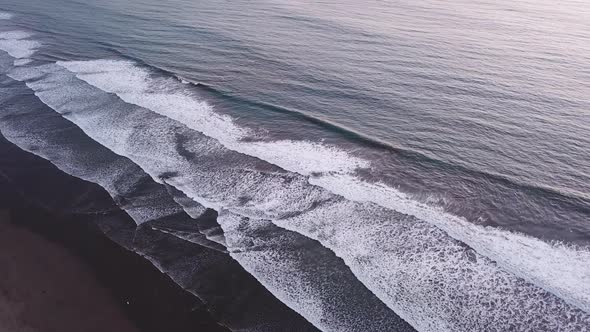 Flying Over Blue Ocean With Scenic Tropical Waves In Olon Beach, Ecuador. - Aerial Drone Shot alt