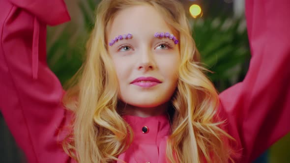 Beautiful Smiling Young Girl Holding Lemons Near Eyes alt