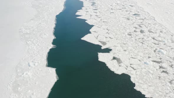 Slow Flight of a Drone Over Floating Ice in a Strait Among Solid Ice alt