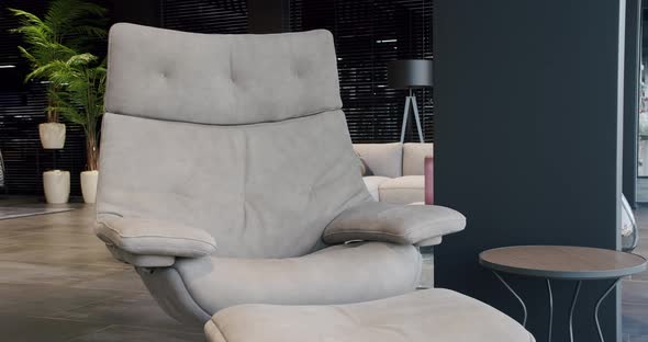 Elegant and comfortable armchair in house, warm and cozy. Design armchair. alt